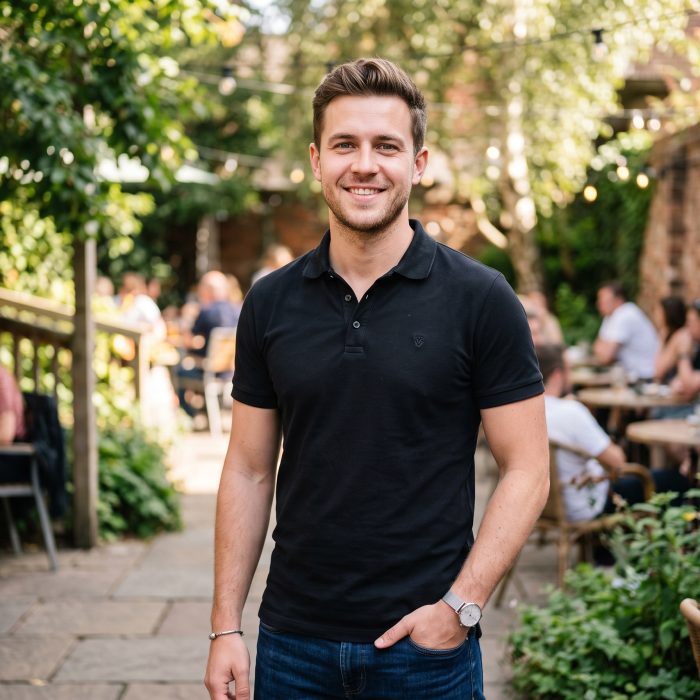Guy_wearing_black_polo_shirt_202608031038